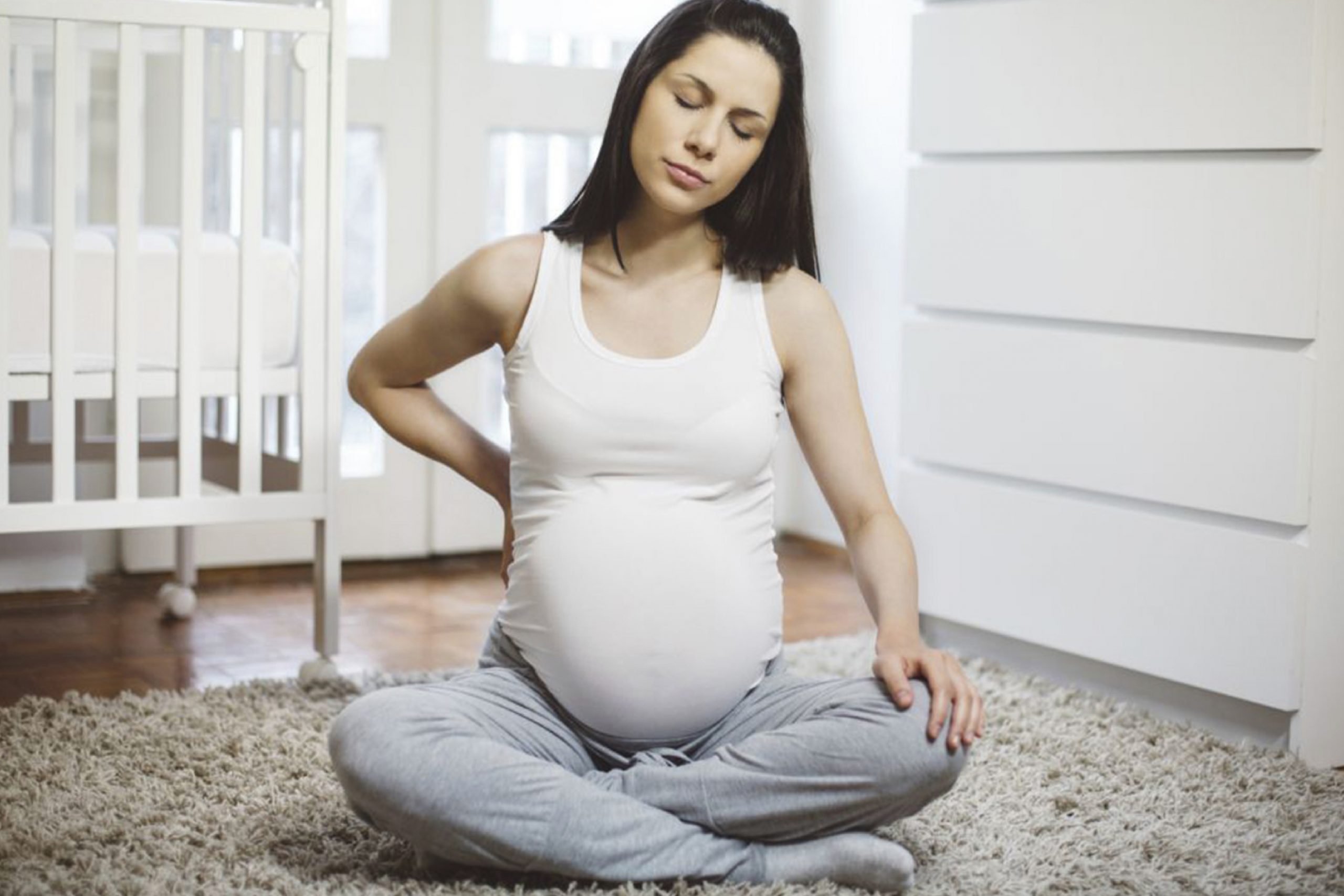 Dores de coluna na gravidez: entenda e saiba como aliviá-las